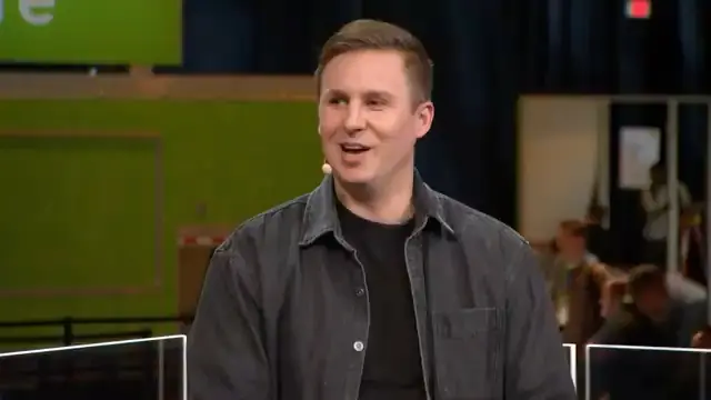 Figure CEO Brett Adcock sits on a panel stage during NVIDIA GTC 2025