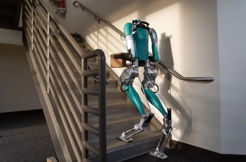 Digit humanid robot walking up some stairs