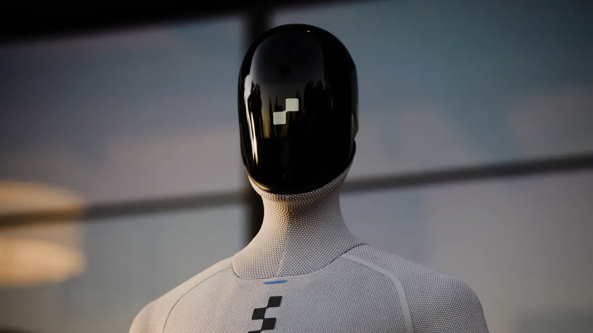 A close-up photograph of the Figure 03's head and shoulders.