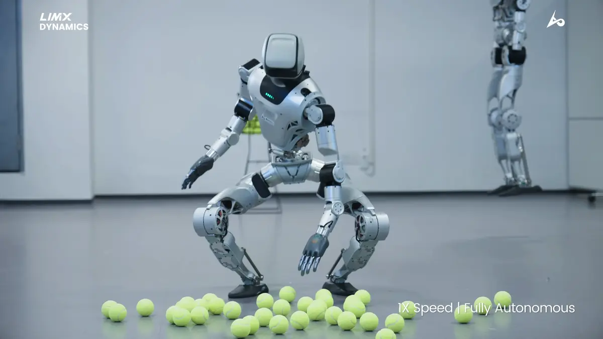 LimX Dynamics humanoid robot Oli picks up a tennisball