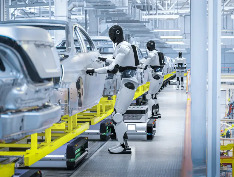 Computer rendition of NEURA Robotics 4NE-1 humanoid robots working in a car factory