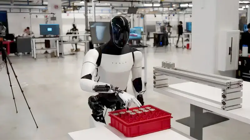Tesla Optimus humanoid robot sorting batteries