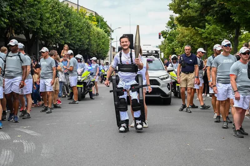 Paraplegic athlete Kevin Piette made history by carrying the Olympic torch in Paris using a Wandercraft exoskeleton – completely hands-free