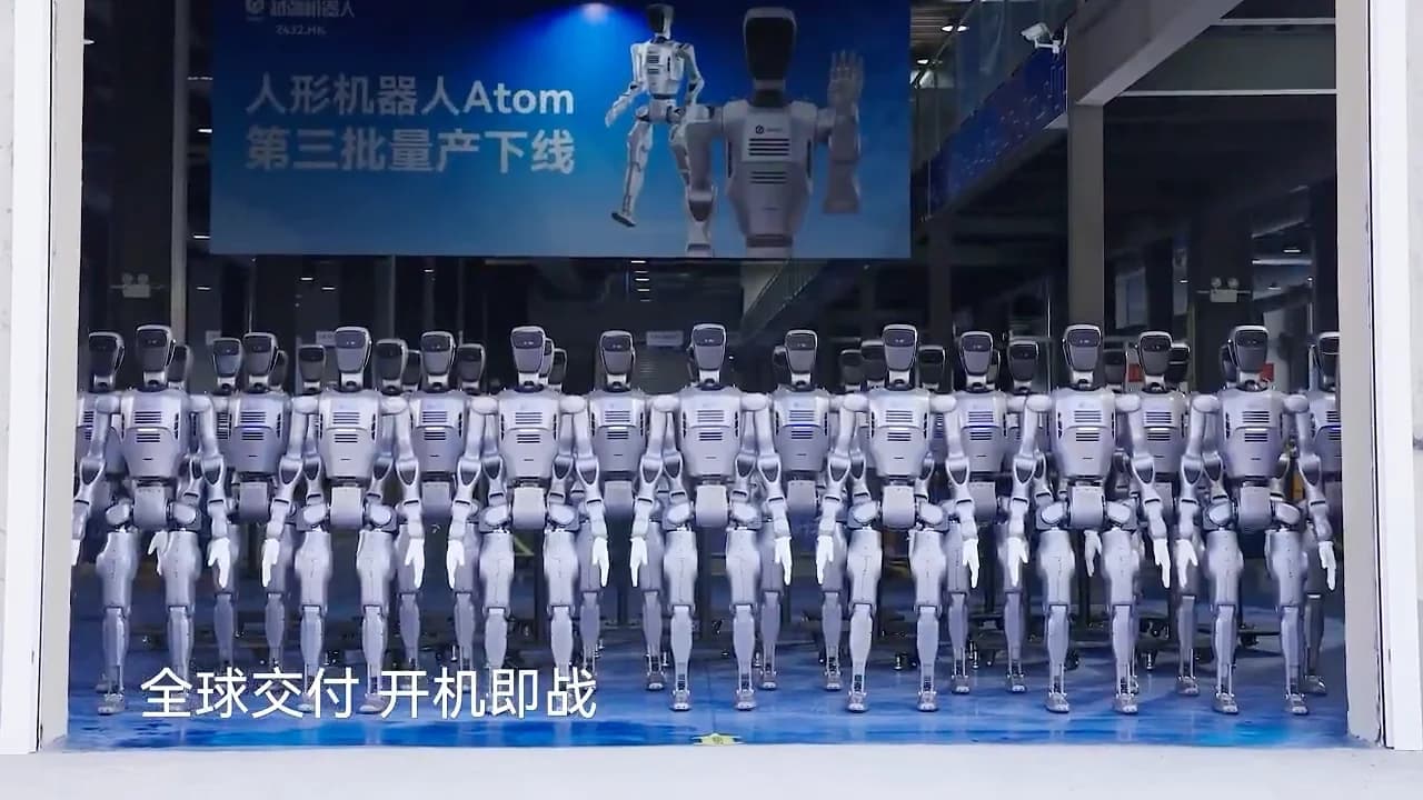 A wide shot of a 'robot army' of ATOM humanoid robots standing in perfect formation behind a large open warehouse door. A blue banner above them features Chinese text and an image of the robot, while the foreground shows a blue-tinted floor with additional Chinese captions.