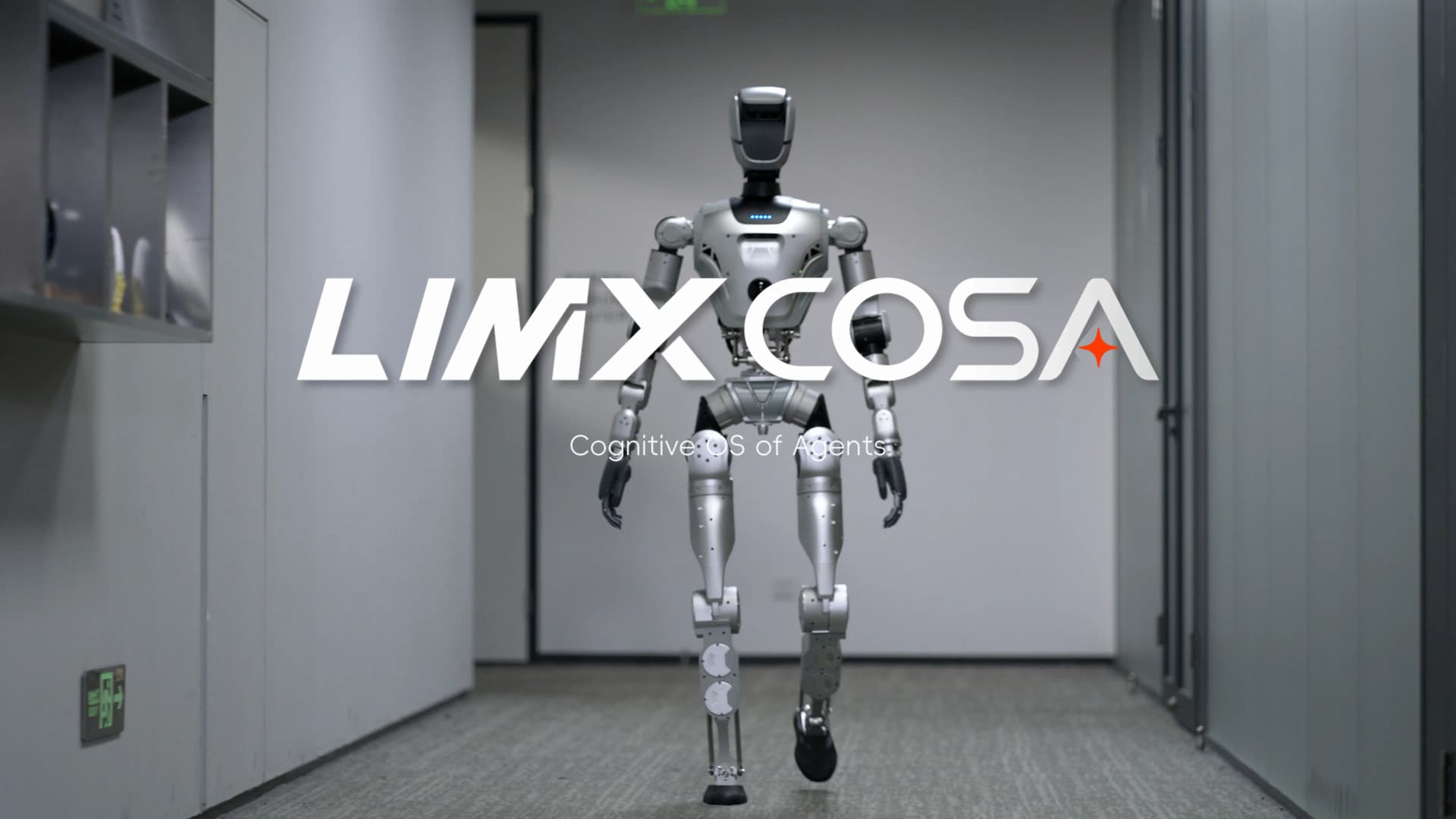 A full-body view of the silver LimX Dynamics Oli robot walking down a minimalist hallway, with a large digital overlay reading 'LIMX COSA: Cognitive OS of Agents.'