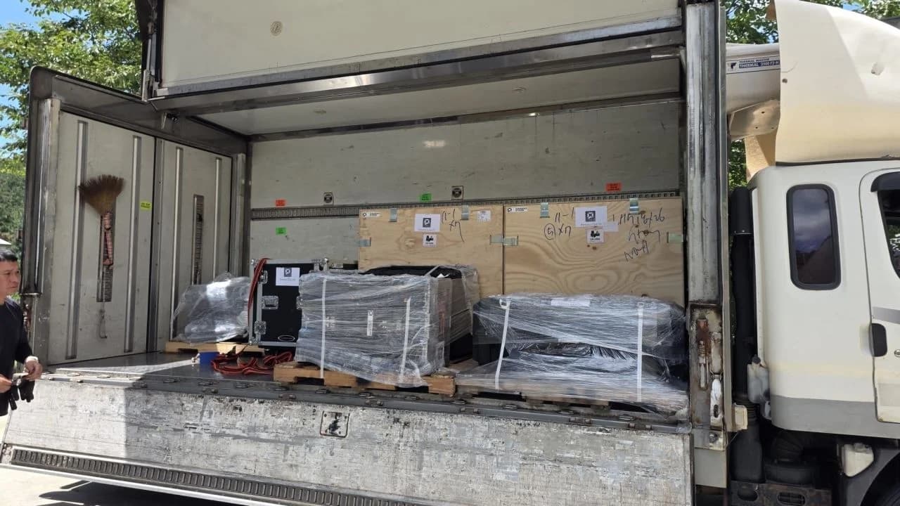 Persona AI shipping crates loaded into a transport truck