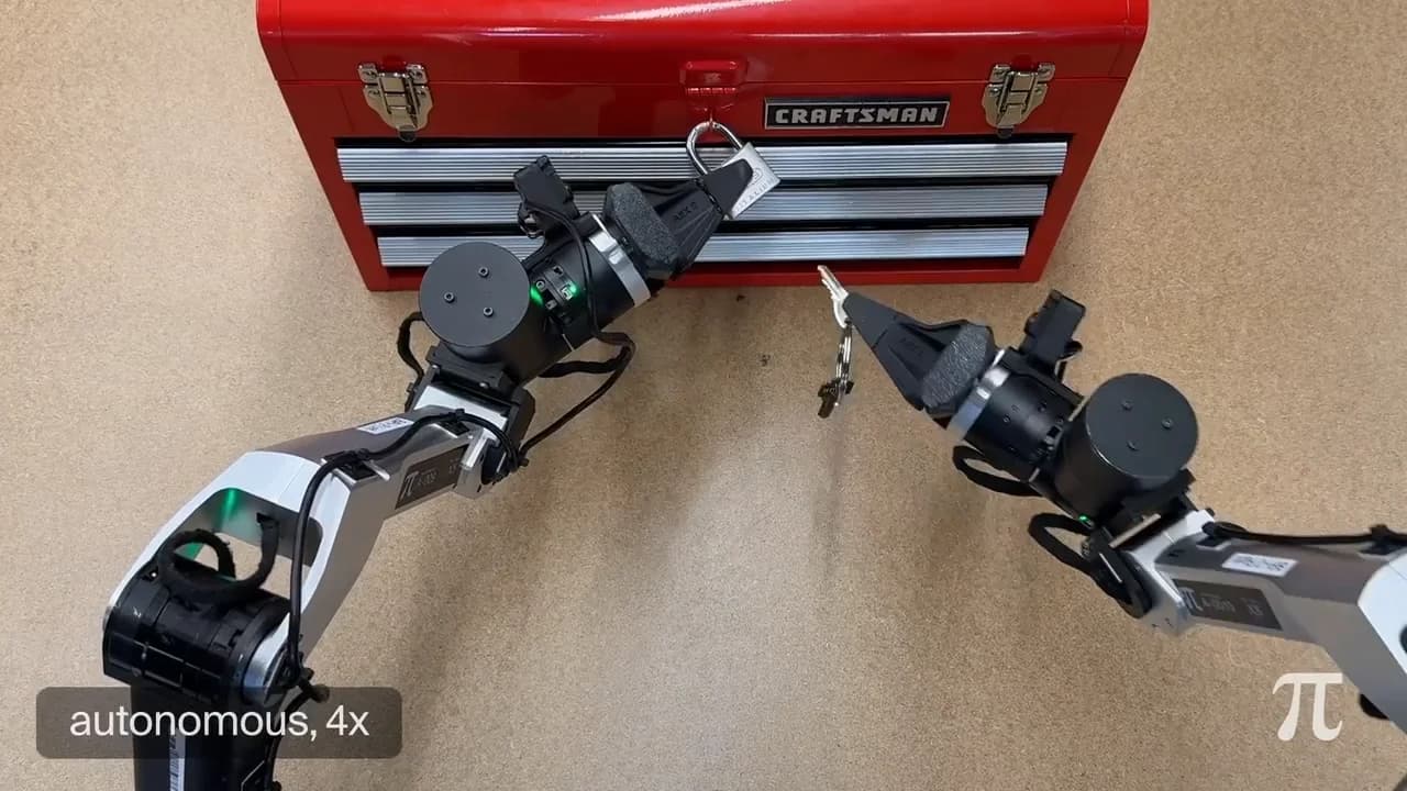 Two robotic arms positioned over a wooden surface. The left arm holds a silver padlock attached to a red Craftsman toolbox, while the right arm holds a set of keys, extending one toward the lock's keyhole.