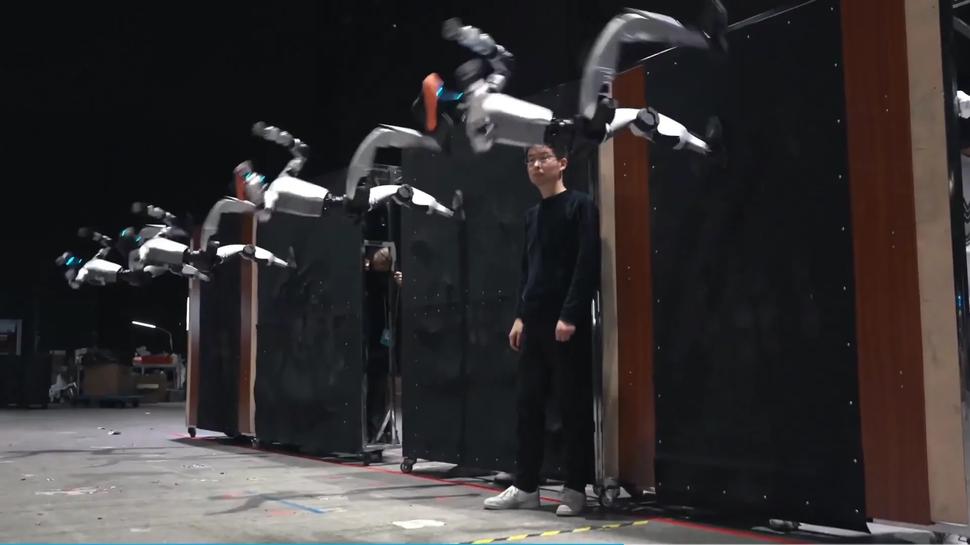Watch: Unitree Previews "Cluster Cooperative" Tech with Mass Humanoid Performance