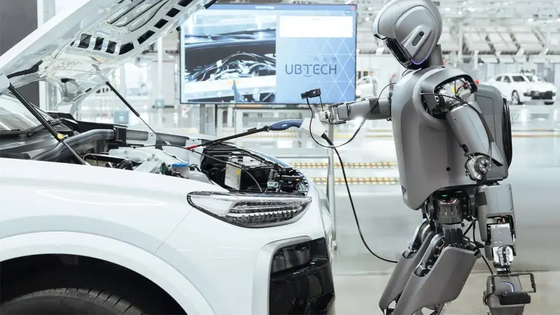 An UBTech Walker S1 humanoid robot works at the assembly line of an Audi factory
