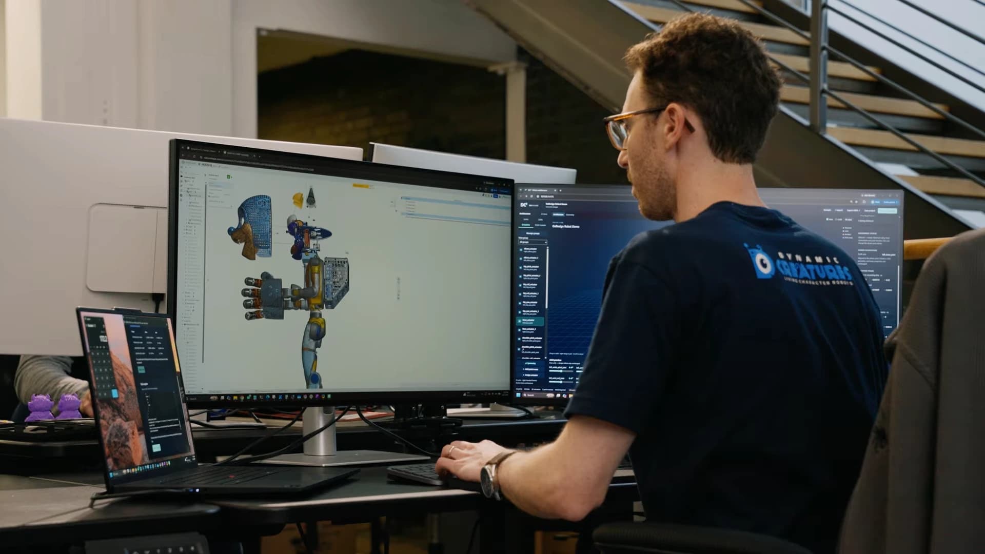 A developer views a mechanical model of Hugo with the character covering separated from the robot structure.