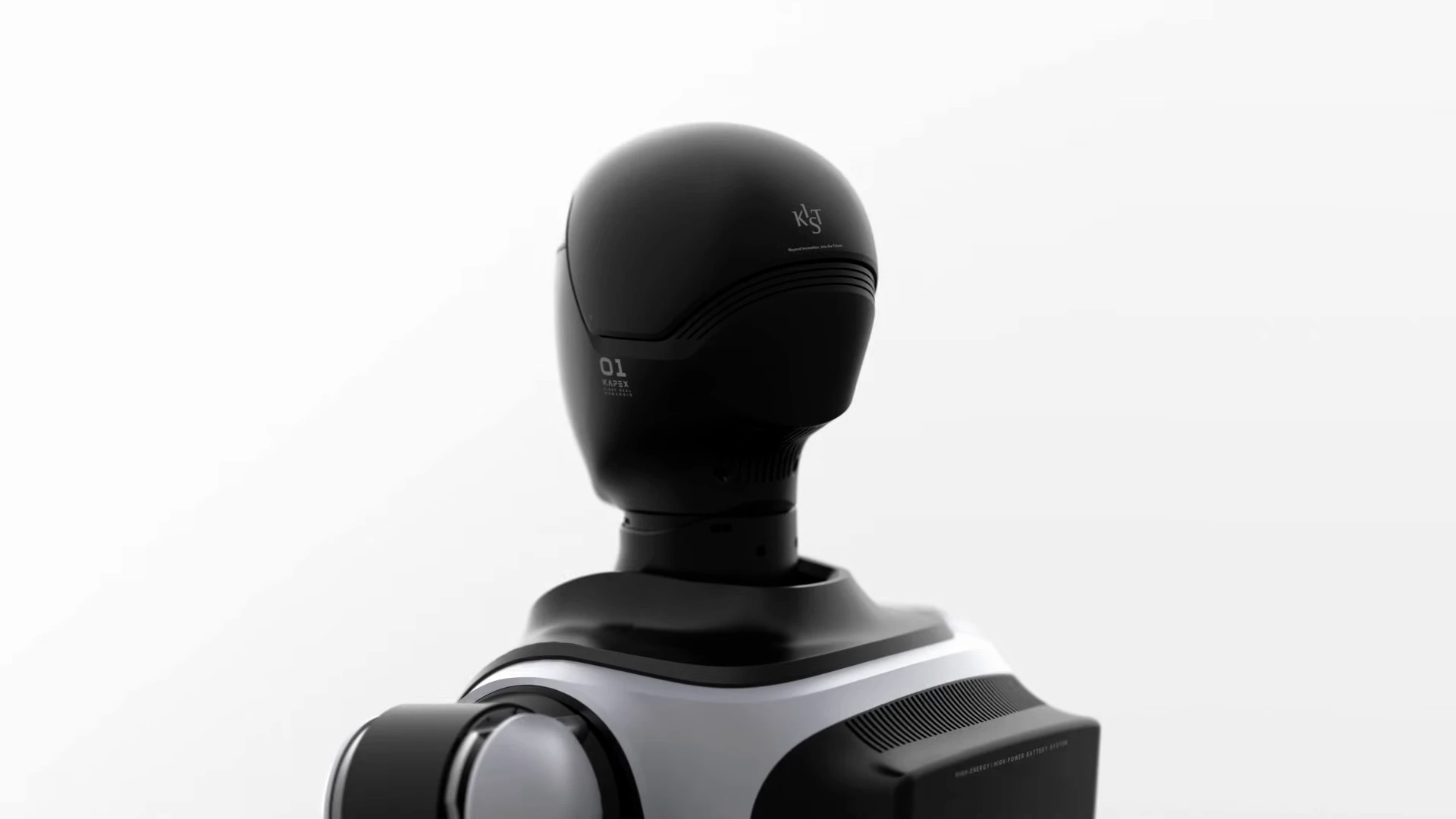 Close-up of KAPEX’s black head and silver shoulders against a white background, with KIST and KAPEX markings visible.