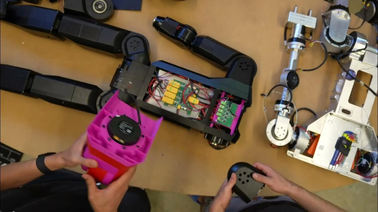 A K-Scale bot laying on the floor