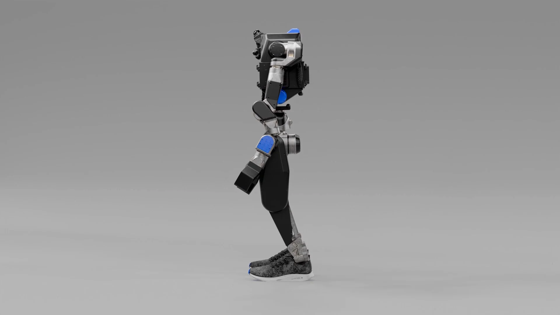 A side profile render of the bipedal Noble Machines robot, showing its upright posture and specialized footwear for navigating industrial terrain.