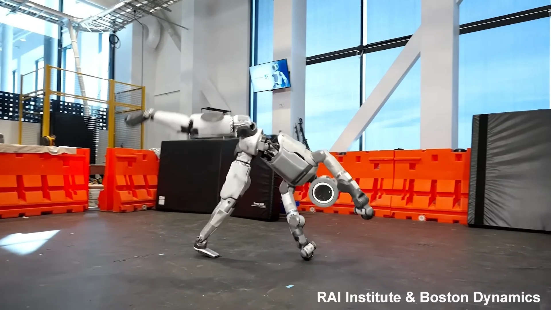 Humanoid robot Atlas showcasing a whole-body learning framework developed by the RAI Institute and deployed by Boston Dynamics