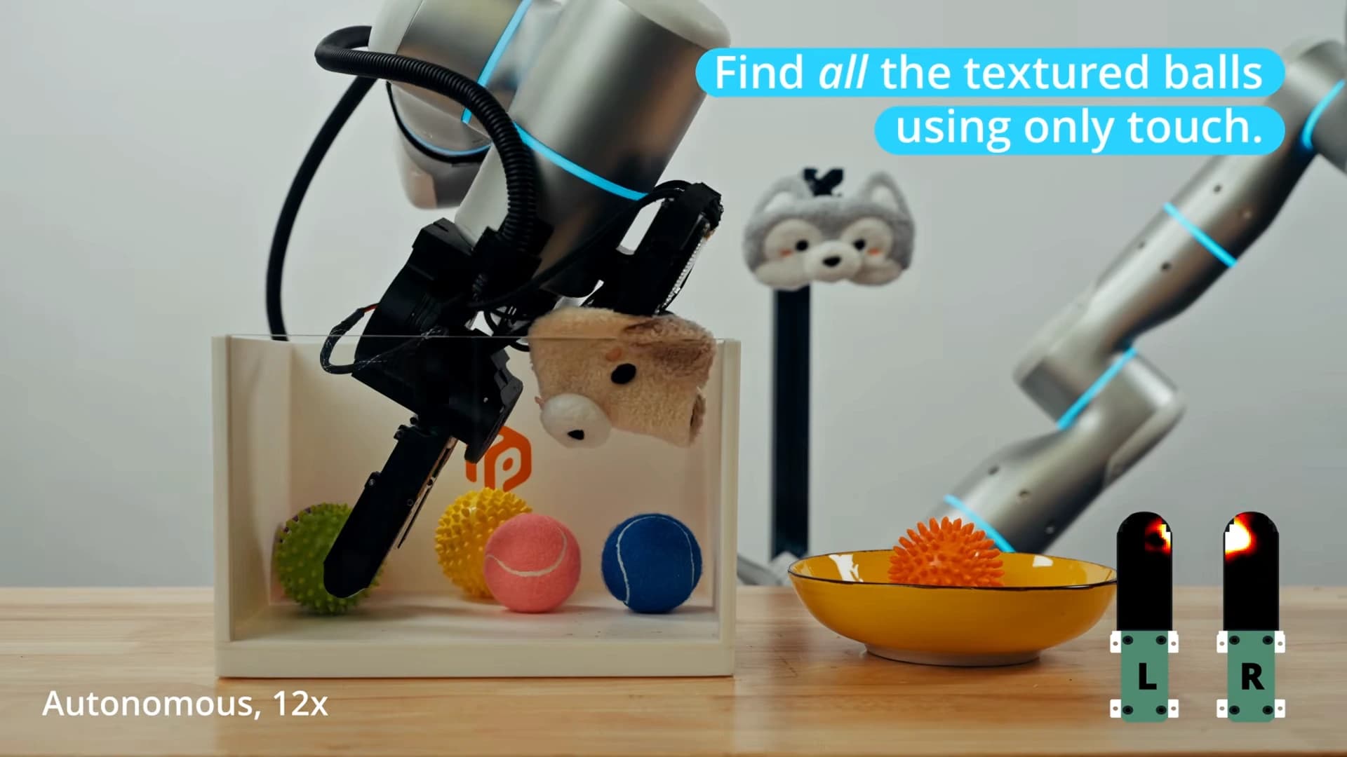 Rhoda robot gripper searching a box of smooth and textured balls using tactile sensors, with sensor readings displayed.