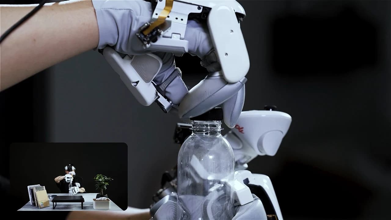 A human wearing TwinDEX grasps a bottle cap with the wearable three-finger interface; an inset shows the full collection setup.