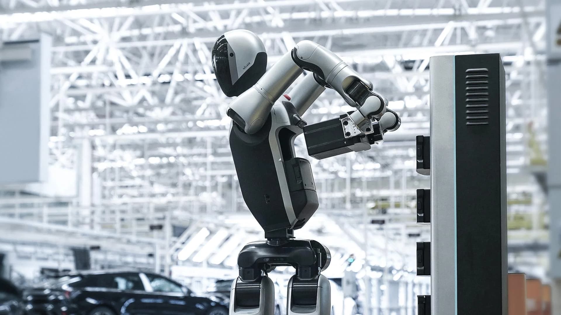 A UBTECH Walker S2 humanoid robot seen swapping its own battery